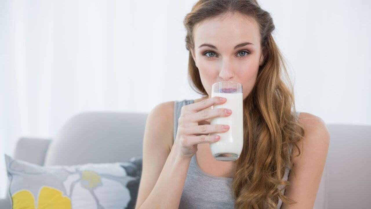 Beautiful Grown Woman Drinking Milk