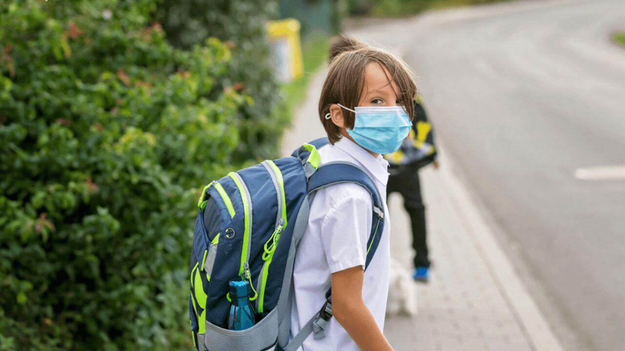 Boy Carrying Schoolbag