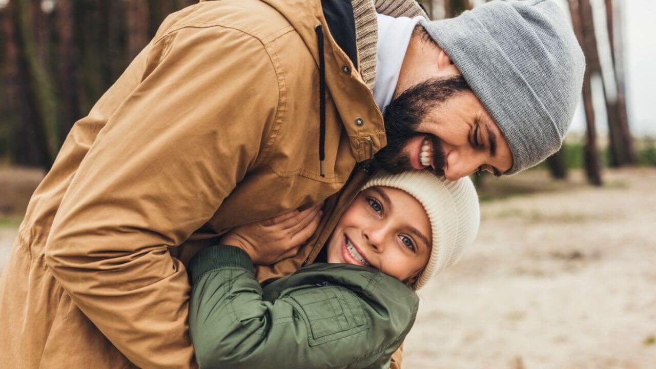 Father and Daughter Hugging Each Other