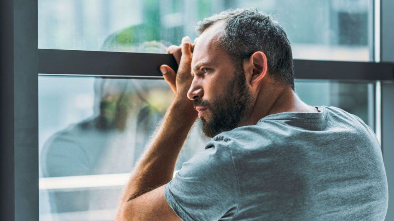 Lonely Man by the Window