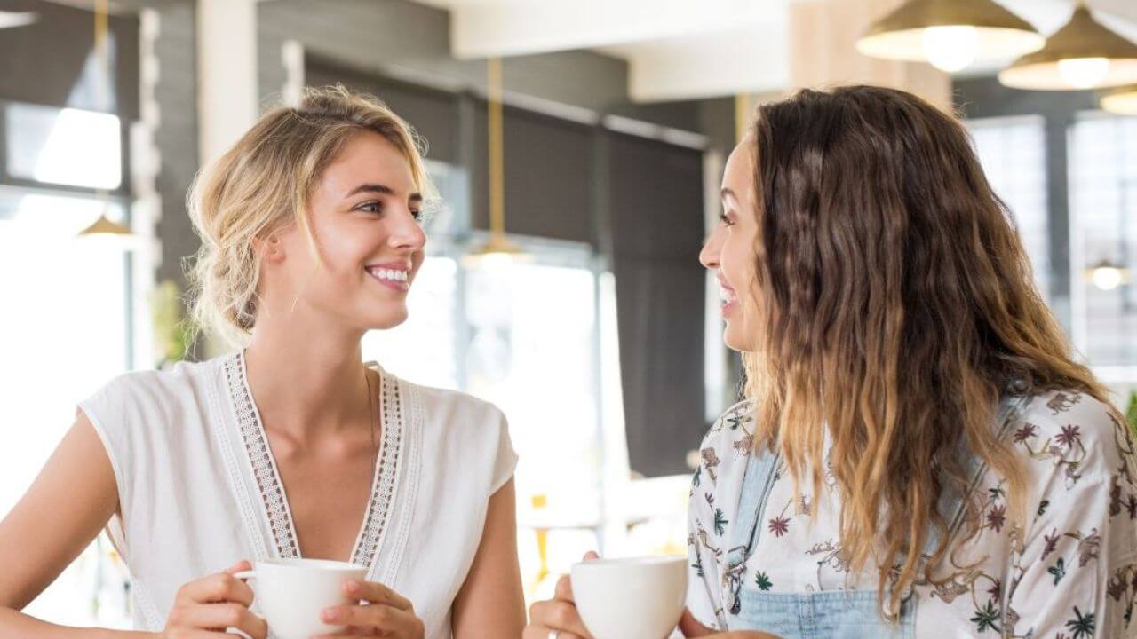 Two Women Talking Over Coffee