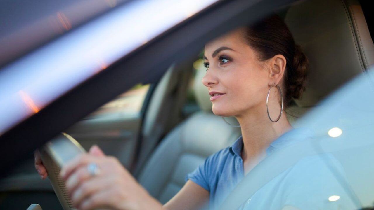 Woman Driving a Car