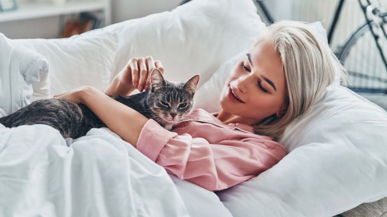 Woman Playing with Her Cat