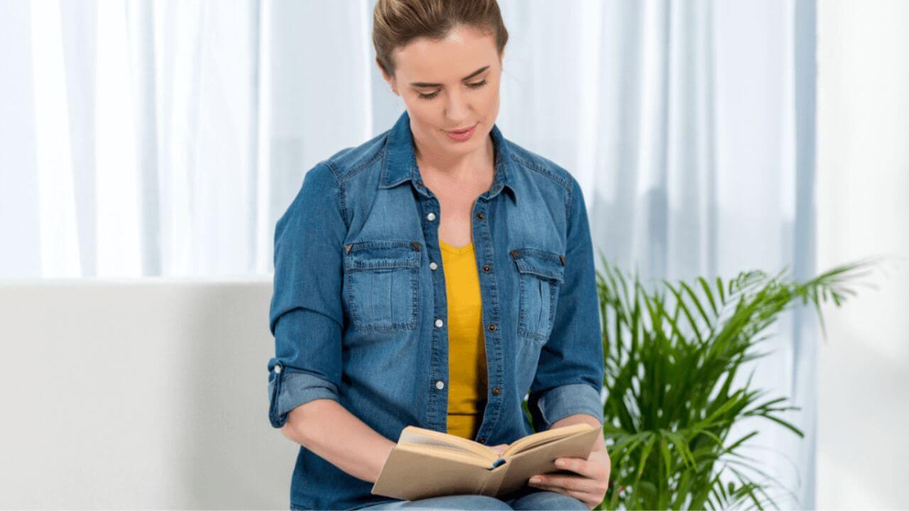 Woman Reading Book at Home