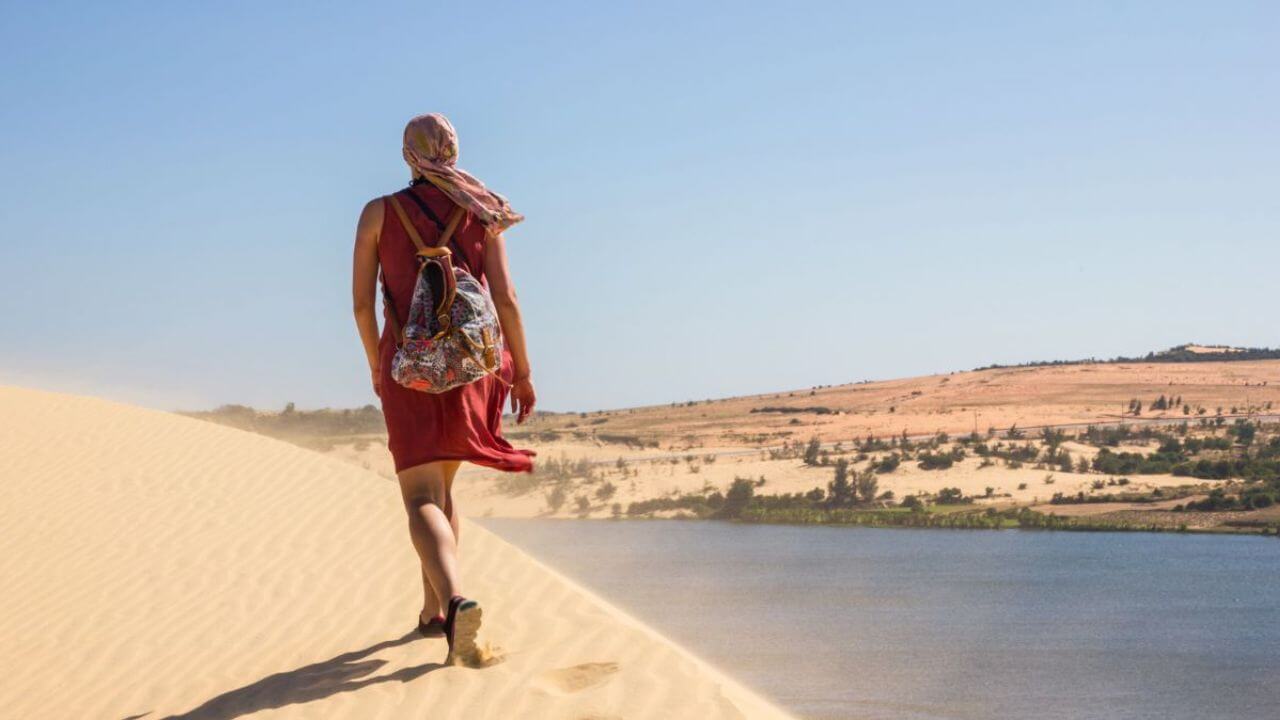 Woman Walking Hiking in a Semi-Desert Place