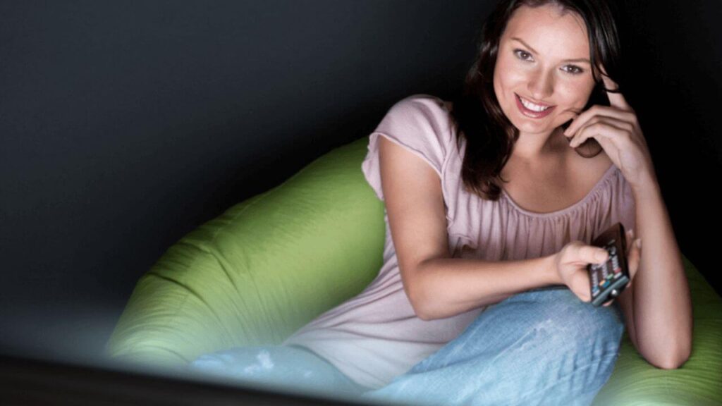 Young Woman Watching TV